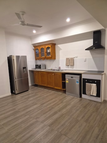 Private kitchen. Spacious & Comfortable Stay | Central Location