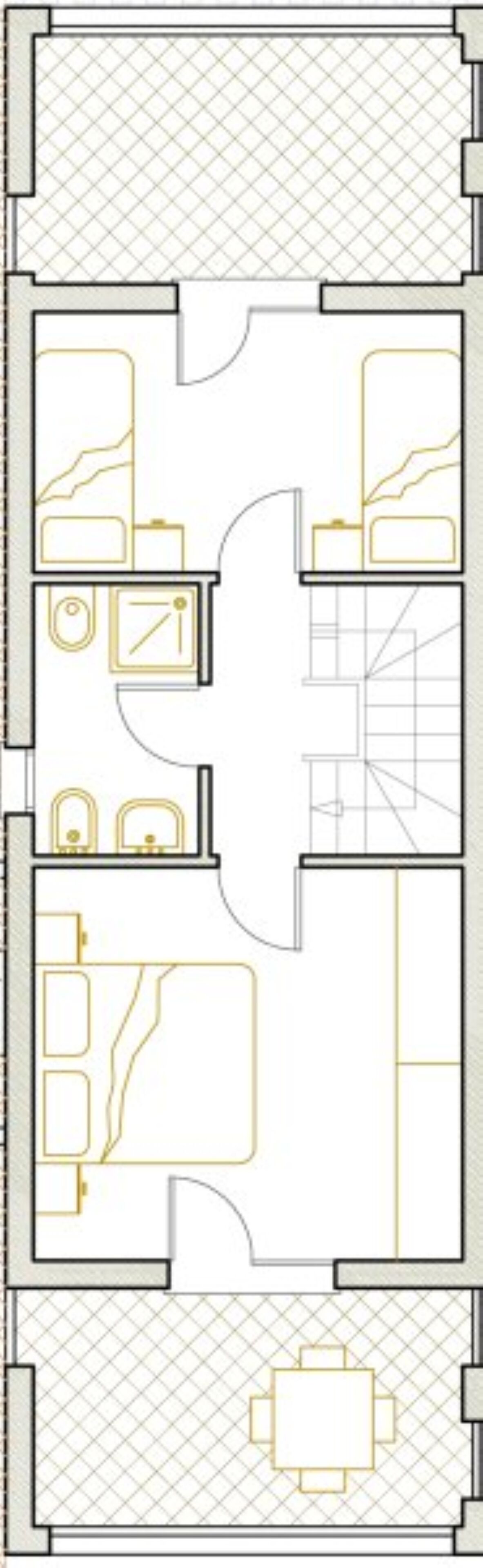 Grundriss eines Hotelzimmers mit Bett, Schreibtisch, Stuhl, Badezimmer und einer kleinen Sitzecke.