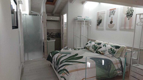 2 bedrooms, in-room safe, iron/ironing board, travel cot