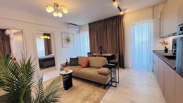 Apartemen Comfort, 2 kamar tidur, Bebas Asap Rokok | Area keluarga | Smart TV 126-cm dengan saluran TV digital