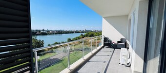Bright Apartments by SunLake Residence