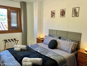 Iron/ironing board, travel crib, free WiFi, bed sheets