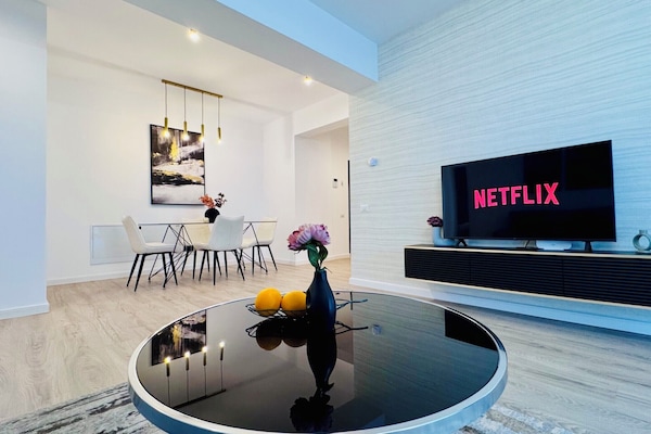 Deluxe Apartment, 2 Bedrooms, Non Smoking | Living area | 126-cm Smart TV with digital channels