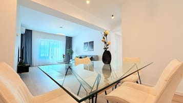 Deluxe Apartment, 2 Bedrooms, Non Smoking | Living area | 126-cm Smart TV with digital channels