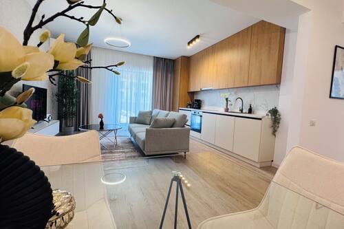 Appartement Deluxe, 2 chambres, non-fumeur | Aire de séjour | Téléviseur connecté de 126 cm avec télévision numérique