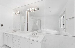 Shower, jetted tub, hair dryer, towels