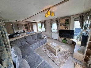 Living area - Unwind in our stunning premium waterside retreat. Full wraparound decking (Humberston)