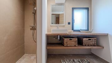 Shower, towels, soap, toilet paper