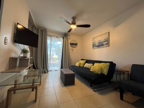 TV - This beautiful 2-bedroom, 2-bath condo is a true gem (Playas Del Coco)