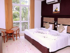 Deluxe Double Room, Balcony, Garden View | Laptop workspace, WiFi (free)