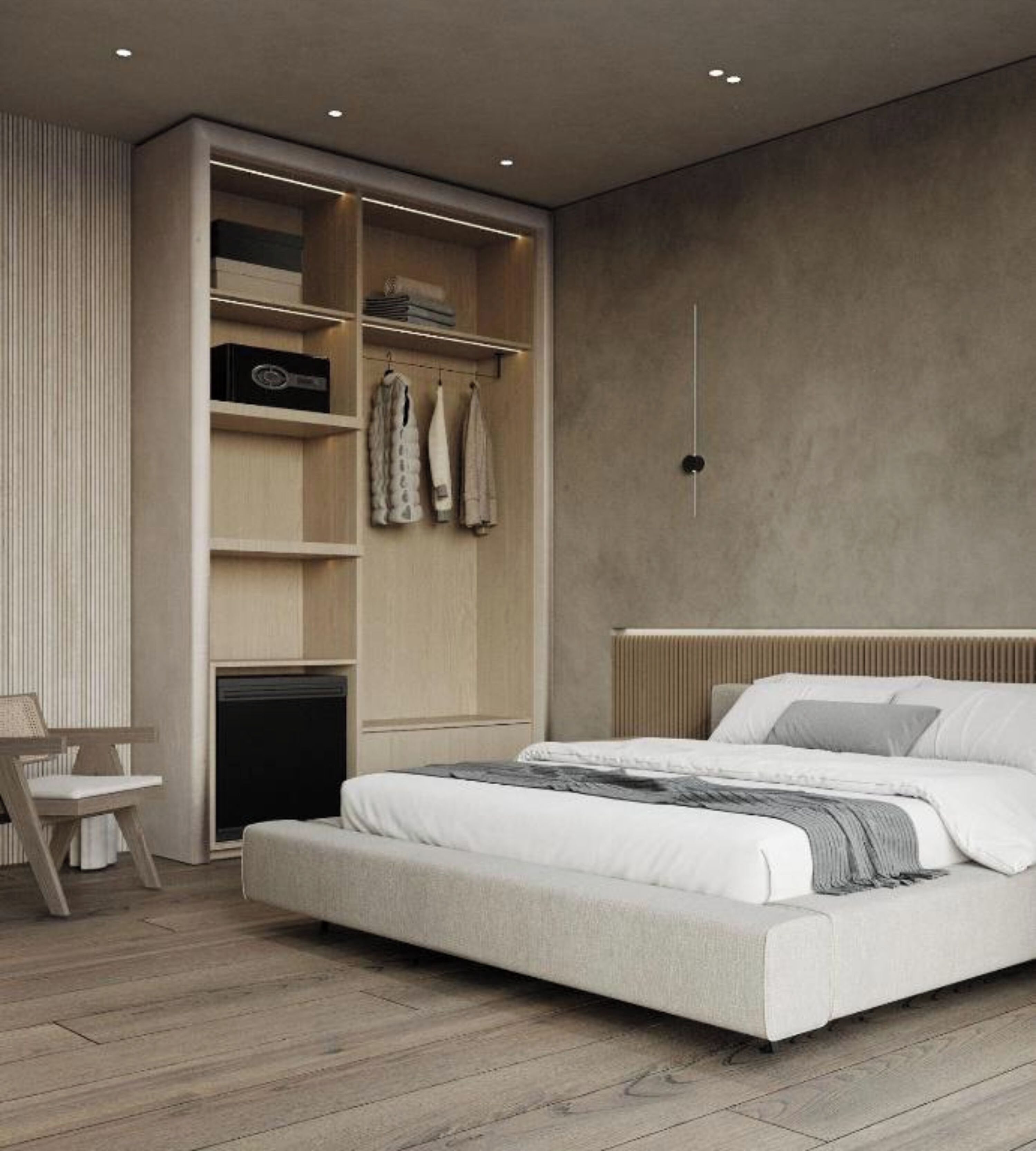 A modern bedroom with a bed, built-in wardrobe, and a desk.