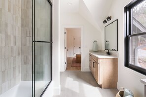 Shower, hair dryer, towels, soap