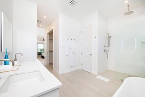 Shower, towels, soap, shampoo - Oceans 9: Seaside Lazy River Pool, Sunken BBQ Ocean Lounge + Designer Interiors in West Bay (Grand Cayman)