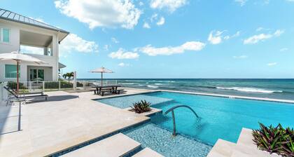 Oceans 9: Seaside Lazy River Pool, Sunken BBQ Ocean Lounge + Designer Interiors in West Bay