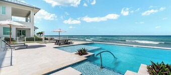 Oceans 9: Seaside Lazy River Pool, Sunken BBQ Ocean Lounge + Designer Interiors in West Bay