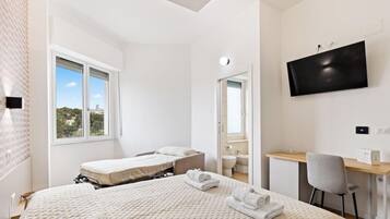1 chambre, fer et planche à repasser