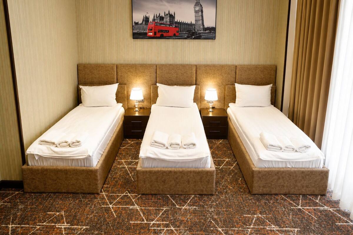 Chambre Familiale Double ou avec lits jumeaux, vue ville