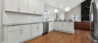 Spacious Riverfront Retreat With Wraparound Porch And Room For The Whole Team