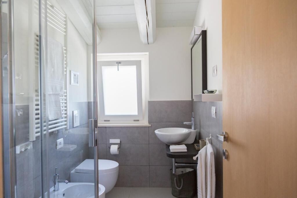 Family Suite, Patio, Garden View | Bathroom | Free toiletries, hair dryer, towels, soap