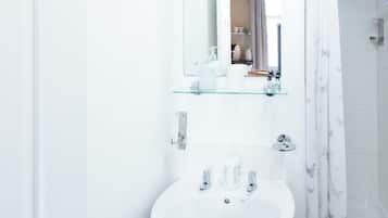 Shower, towels, toilet paper