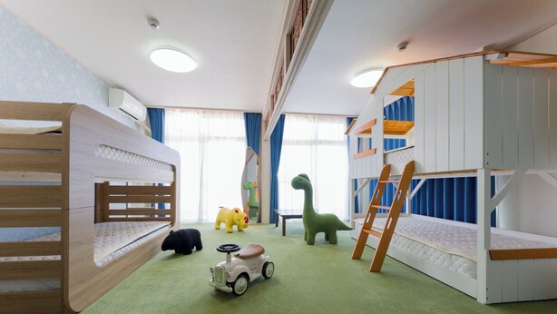 A child's playroom with bunk beds, a toy car, and a dinosaur toy. - Luce Suzaki (Shimoda)