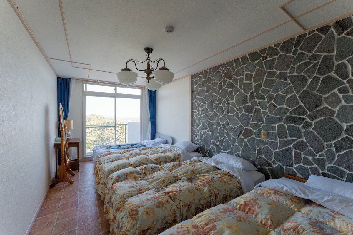 Chambre Quadruple, vue mer | Wi-Fi gratuit