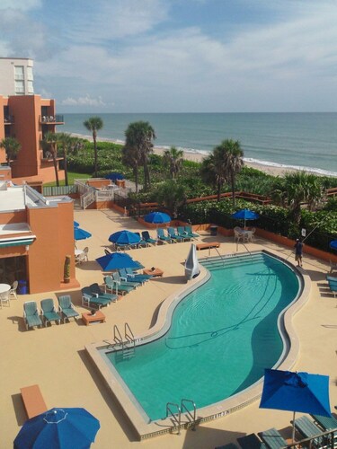 Oceanique 1: Coastal Getaway: 2BR Beachfront Resort Condo