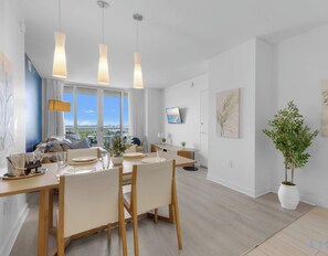 Dining - Kitchen - Elegant 2BR Condo · Beachwalk Resort Pool (Hallandale Beach)