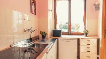 Apartamento, balcón, vistas a la ciudad | Cocina privada