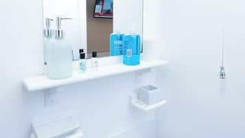 Shower, towels, toilet paper