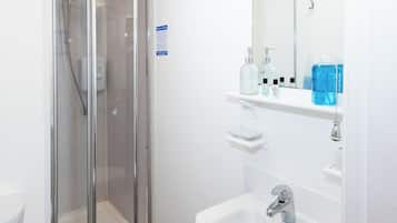 Shower, towels, toilet paper