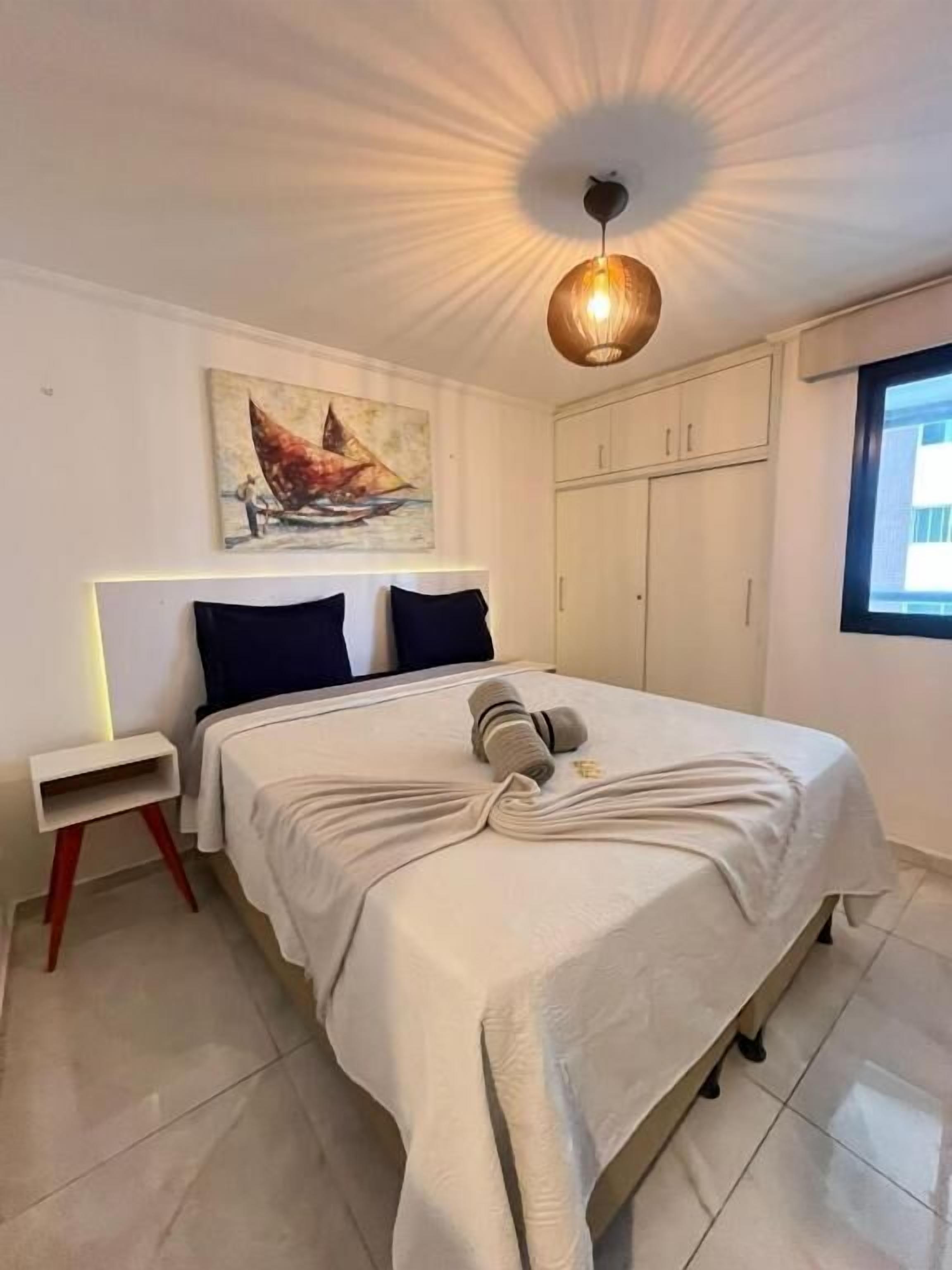 Deluxe appartement, gedeeltelijk uitzicht op oceaan | Verduisterende gordijnen, een strijkplank/strijkijzer, gratis wifi