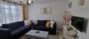Living area - Cozy 1-Bedroom Apartment in Westpark Heights (flyover)