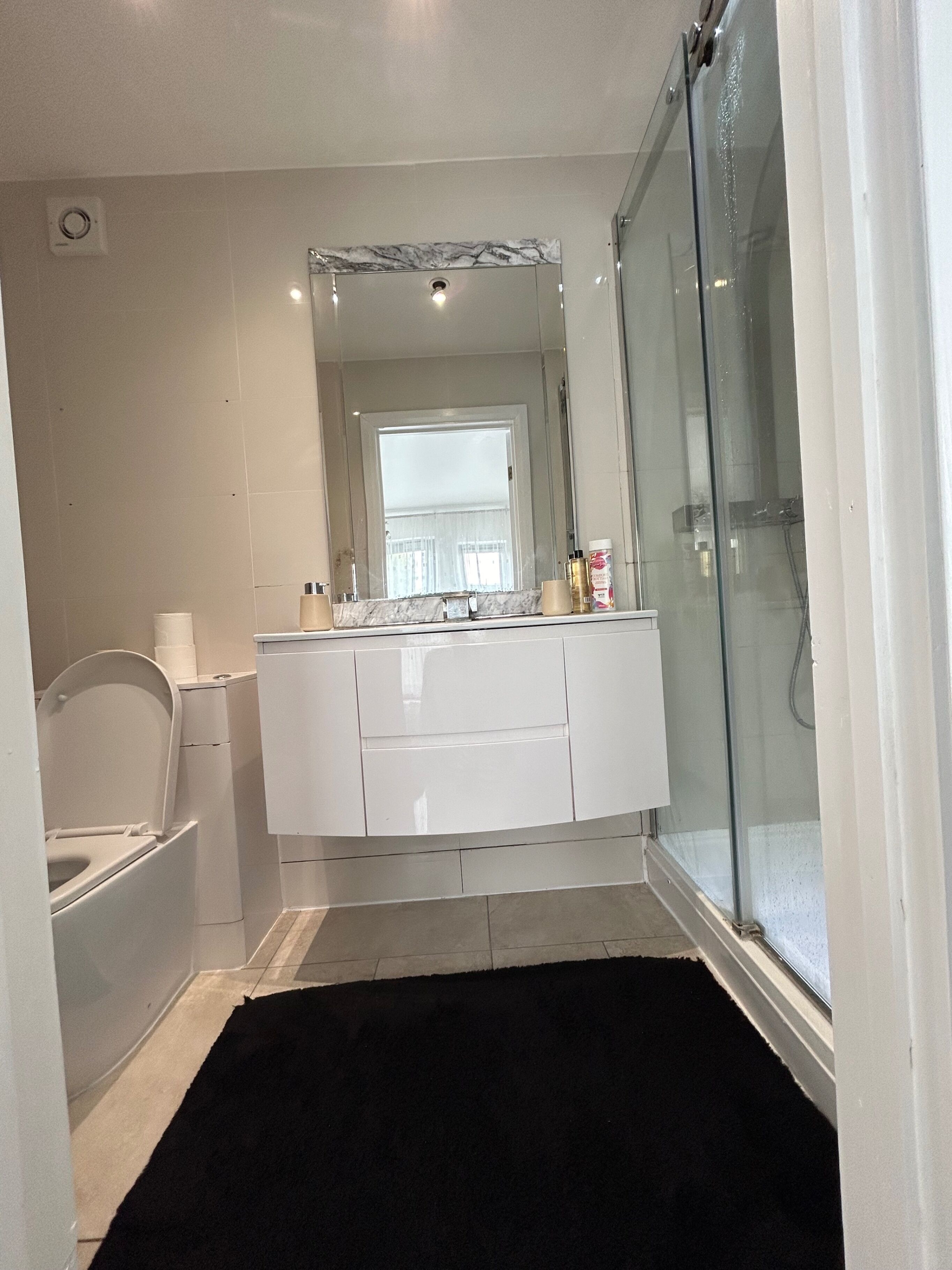 Shower, deep-soaking bathtub, hair dryer, towels