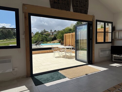 Peaceful rural retreat close to the coast with views and pool.