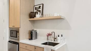 Fridge, microwave, coffee/tea maker, toaster