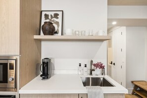 Fridge, microwave, coffee/tea maker, toaster