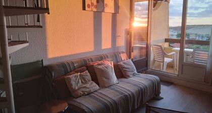 Charming T2 bis + mezzanine with good volume in front of the dune with sea view