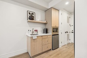 Fridge, microwave, coffee/tea maker, toaster