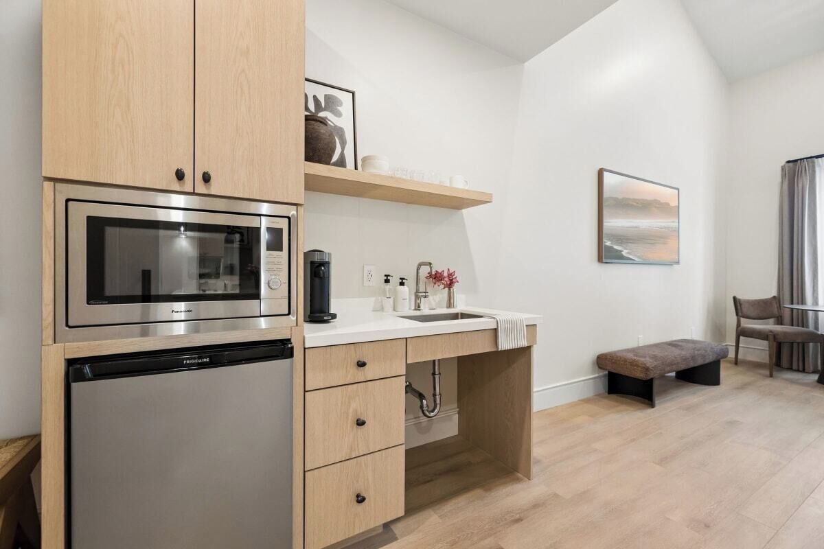 Fridge, microwave, coffee/tea maker, toaster