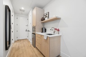 Fridge, microwave, coffee/tea maker, toaster