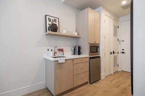 Fridge, microwave, coffee/tea maker, toaster
