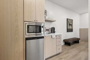 Fridge, microwave, coffee/tea maker, toaster