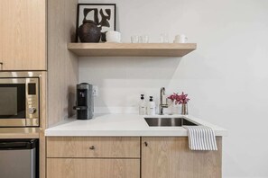 Fridge, microwave, coffee/tea maker, toaster