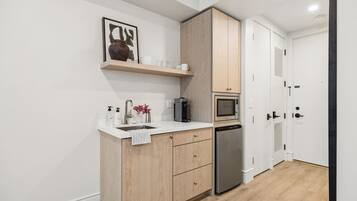 Fridge, microwave, coffee/tea maker, toaster