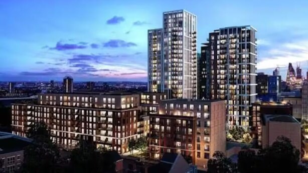 A high-rise building with multiple floors, large windows, and a modern architectural design. - Air conditioner 2 Bedroom central flat (London)