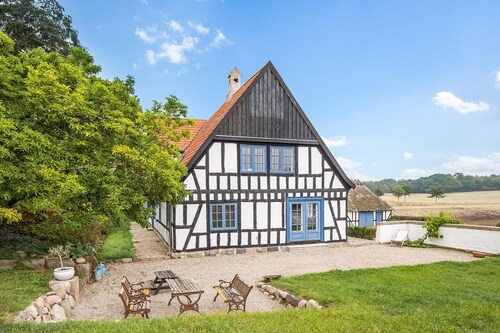 Idyllic country house with own forest in fantastic nature.
