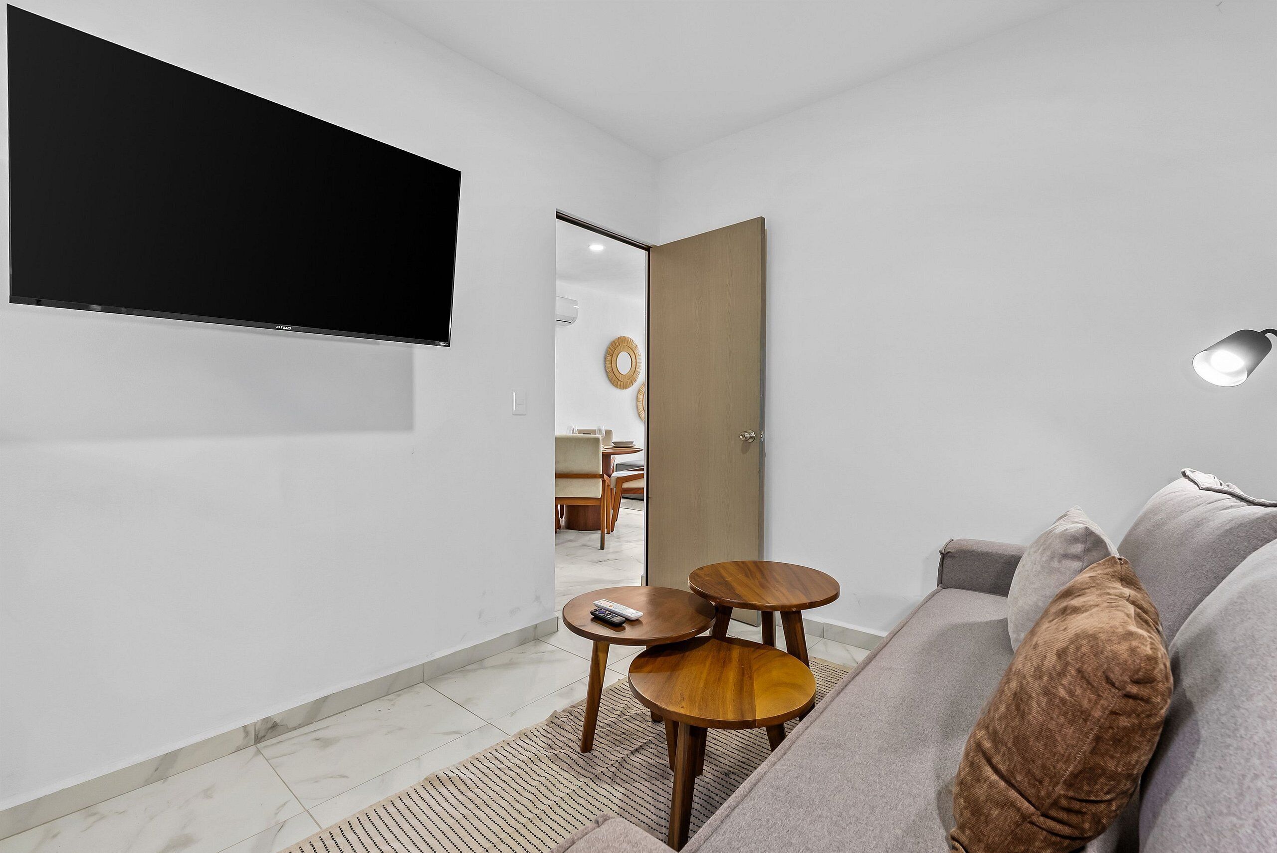 Villa | Living area | 60-inch LED TV with cable channels
