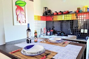 Private kitchen - Sweet Studio in Camburi (São Sebastião)