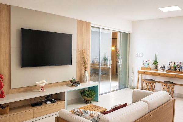 Premium House | Living area | 65-inch Smart TV with digital channels, Netflix, pay movies